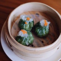 Steamed Shrimp Dumplings topped with Bird's Nest and Tobiko